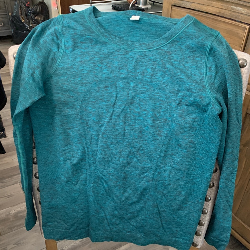 Lululemon shirt. Hunter green, could not get perfect picture of color. See below